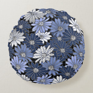 Blauw en wit madeliefjespatroon rond kussen