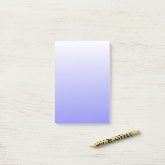 Blauw en wit verloop post-it® notes (Op bureau)