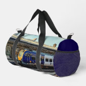 Blauw-gele trein, op het station plunjezak (Rechterhoek)