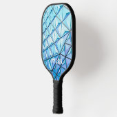 Blauw geometrisch ontwerp, witte benaming pickleball paddle (Links)