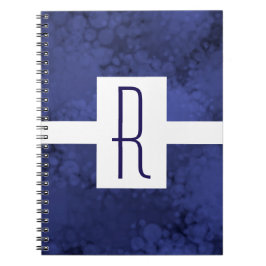 Blauw gespikkeld monogram notitieboek