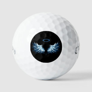 Blauw glanzende engelenvleugels op zwarte achtergr golfballen