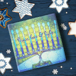 Blauw Groen Chanoeka Menorah Vrede Liefde Licht Ve Stenen Onderzetter<br><div class="desc">"Vrede, liefde & licht." Een close-upfoto van een heldere, kleurrijke, blauwe en groene kunstzinnige menora helpt je in stijl de vakantie van Chanoeka in te luiden. Voel de warmte en vreugde van het vakantieseizoen wanneer u ontspannen met uw favoriete drankje op dit prachtige, kleurrijke Hanukkah stenen onderzetter. Maakt een opvallende...</div>