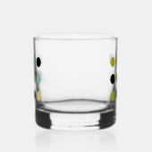 Blauw groen gele cirkels op een raster midden eeuw whisky glas (Links)