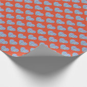 Blauw hartjes patroon op rood cadeaupapier (Hoek)