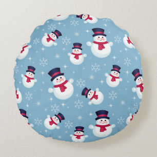 Blauw kerstpatroon met sneeuwpoppen en sneeuwvlokk rond kussen