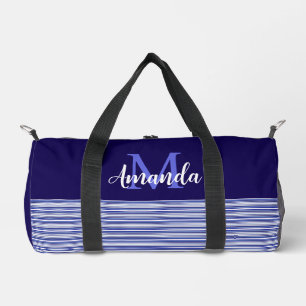 Blauw kleurblok met blauwe zwarte en witte strepen plunjezak