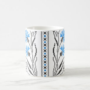 Blauw kornflower kruisstitsontwerp koffiemok