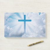 Blauw kruis aan de hemel post-it® notes (Op bureau)