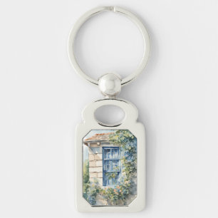 Blauw raam stenen muur cottage wijnstokken sleutelhanger