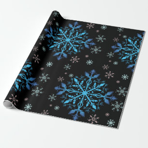 Blauw sneeuwvlokwinterpakpapier cadeaupapier