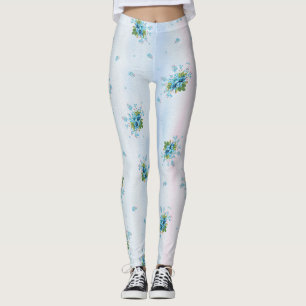 Blauw vergeet-me-niet is op een zacht roze-blauw leggings