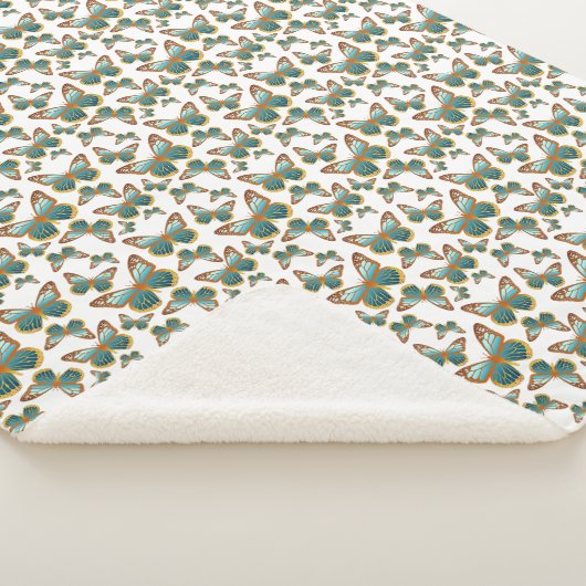 Blauw verloop vlinderpatroon sherpa deken (3/4)