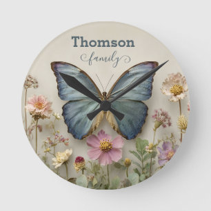 Blauw vlindermotief met bloementuin Familienaam Ronde Klok