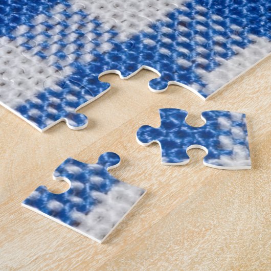 Blauw-wit gevoerde eetkleren. legpuzzel (Zijkant)