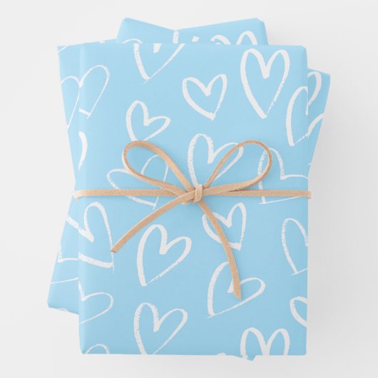 Blauw-wit hartpatroon inpakpapier vel (In situ)