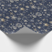 Blauwe achtergrond met elegante gouden sneeuwvlokk cadeaupapier (Hoek)