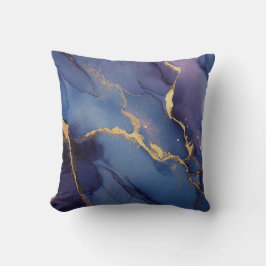 Blauwe achtergrond met gouden strepen en stippen kussen