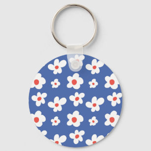 Blauwe achtergrond met witte en rode madeliefjesbl sleutelhanger