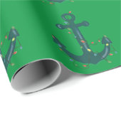 Blauwe ankers met kerstverlichting op groen cadeaupapier (Rol Hoek)
