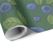 Blauwe bessen op donkergroen cadeaupapier (Rol Hoek)