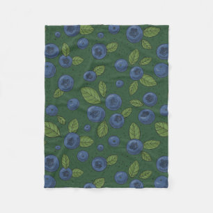 Blauwe bessen op donkergroen fleece deken