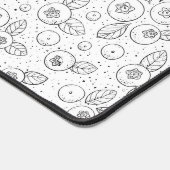 Blauwe bessen op zwart en wit bureaumat (Hoek)