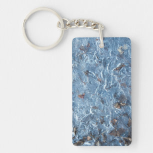 Blauwe bladeren in ijs sleutelhanger