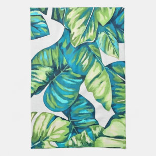 Blauwe bladeren van tropische monstera en banaanbl theedoek