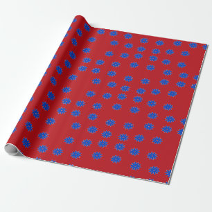 Blauwe bloem op rood cadeaupapier