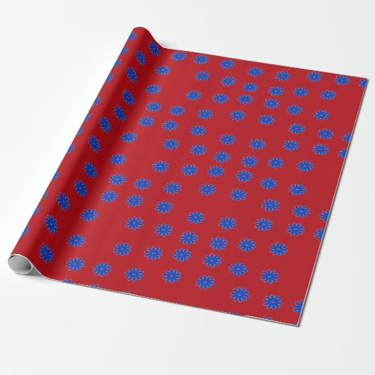 Blauwe bloem op rood cadeaupapier (Uitgerold)