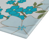 Blauwe bloemen, bloempatroon, patroon van bloemen snijplank (Hoek)