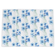 Blauwe bloemen in glazen vaas