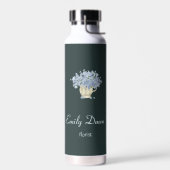 Blauwe bloemen in vasgrijs waterfles (Links)