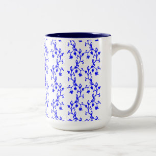 Blauwe bloemlijnen tweekleurige koffiemok