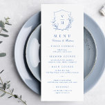 Blauwe, botanische monogram bruiloft menu<br><div class="desc">Monogrammed-initialen,  omgeven door elegante krest en met de hand geïllustreerde botanische bladeren,  menudetails in elegant script en klassiek lettertype,  eenvoudig en luxe. Geweldig blauw en wit menu voor een moderne klassieke bruiloft,  eenvoudige formele bruiloft,  elegante botanische tuinbruiloft. Bekijk alle overeenkomende stukken in het collectie.</div>