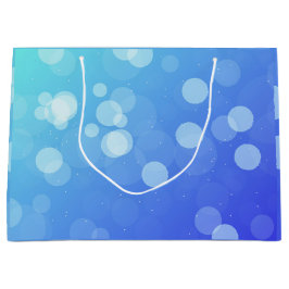 Blauwe cadeautas met witte touwhenkels