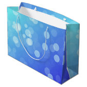 Blauwe cadeautas met witte touwhenkels (Achterkant Gekanteld)