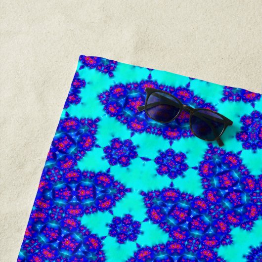 Blauwe caleidoscoop bloeide strandlaken (In situ)