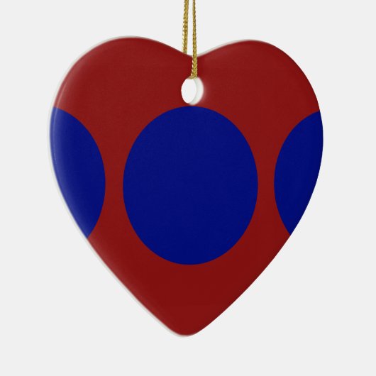 Blauwe cirkels op rood keramisch ornament (Rechts)