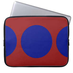 Blauwe cirkels op rood laptop sleeve