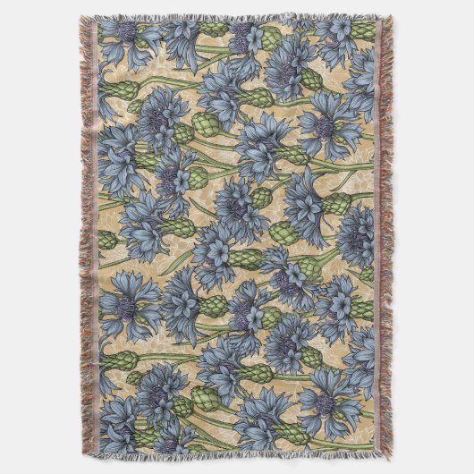 Blauwe cornbloemen, wilde bloemen op honnegeel deken (Voorkant Verticaal)