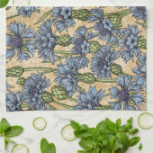 Blauwe cornbloemen, wilde bloemen op honnegeel theedoek (Gevouwen)