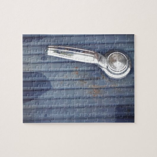  blauwe deur, zilverhandje legpuzzel (Horizontaal)