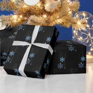Blauwe diamanten sneeuwvlokken op zwart cadeaupapier