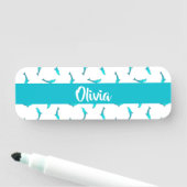 Blauwe dolfijnen op wit naamplaatje (In situ)