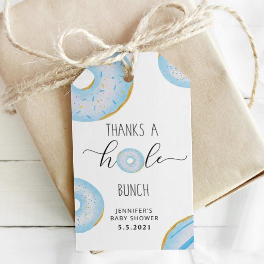 Blauwe donut dankt een hele hoop cadeaulabel
