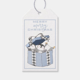 Blauwe doos pinguïns, tassen met kerstcadeautjes cadeaulabel