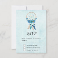 Blauwe droomcatcher met bloemen en veren