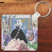 Blauwe elegante vrouw bloemrijke fancy jurk sleutelhanger (Achterkant)